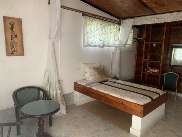 Imagen de la habitación del Hotel NEW PAMOJA RESORT. Foto 18