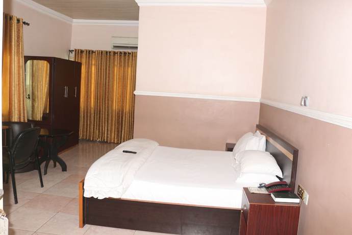 Imagen de la habitación del Hotel NEW POINT HOTEL AND SUITES. Foto 7