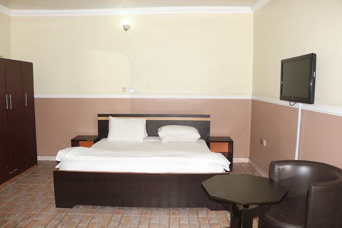 Imagen de la habitación del Hotel NEW POINT HOTEL AND SUITES. Foto 15