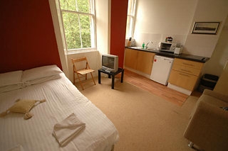 Imagen de la habitación del Hotel NEW TOWN. Foto 4