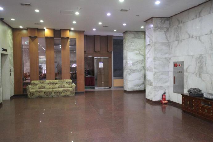 Imagen del bar/restaurante del Hotel NEW WORLD, Jeju. Foto 1