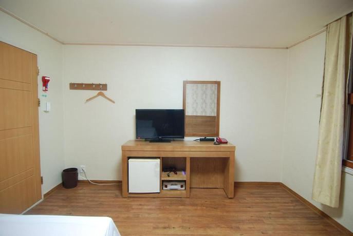 Imagen de la habitación del Hotel NEW WORLD, Jeju. Foto 3