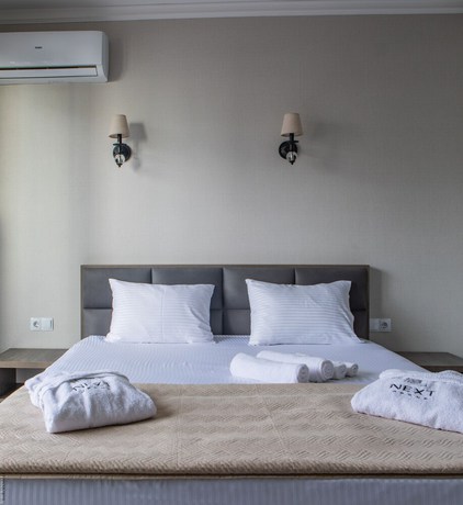 Imagen de la habitación del Hotel NEXT ORANGE HOTEL. Foto 12