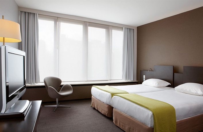 Imagen de la habitación del Hotel NH Amsterdam Caransa. Foto 9