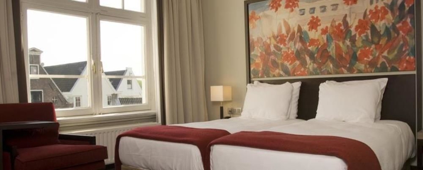 Imagen de la habitación del Hotel NH Amsterdam Schiller. Foto 10