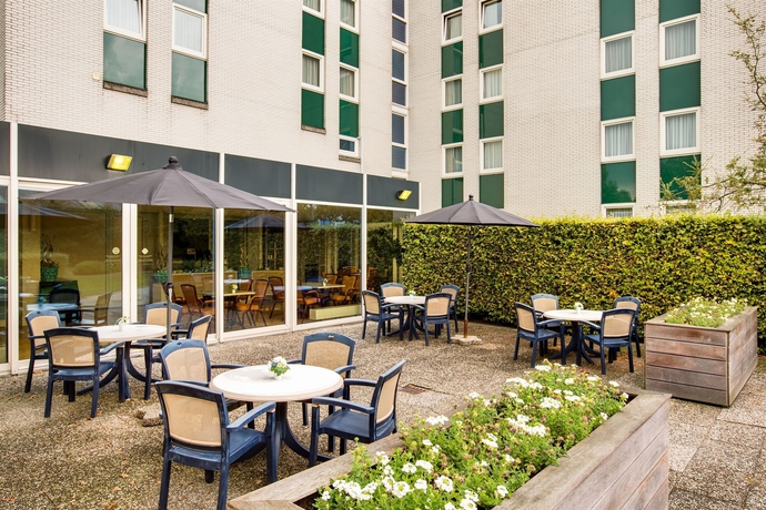 Imagen del bar/restaurante del Hotel NH Best. Foto 8