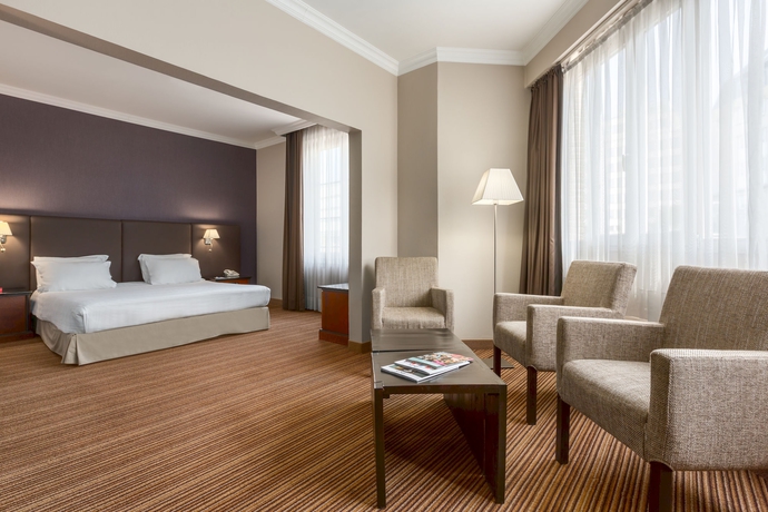 Imagen de la habitación del Hotel NH Brussels Carrefour de l'Europe. Foto 6