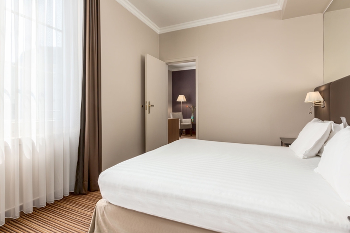 Imagen de la habitación del Hotel NH Brussels Carrefour de l'Europe. Foto 11