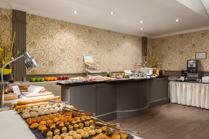 Imagen del bar/restaurante del Hotel NH Brussels Carrefour de l'Europe. Foto 4