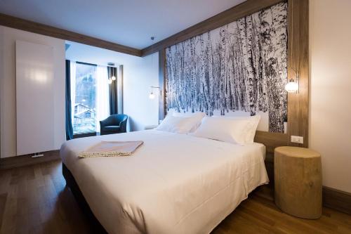 Imagen de la habitación del Hotel NH Collection Alagna Mirtillo Rosso. Foto 9