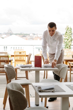 Imagen del bar/restaurante del Hotel NH Collection Brussels Centre. Foto 2