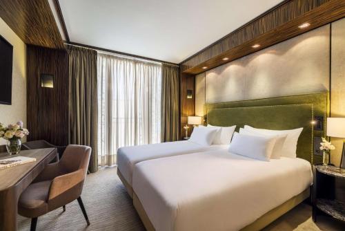 Imagen de la habitación del Hotel NH Collection Carlo IV. Foto 18