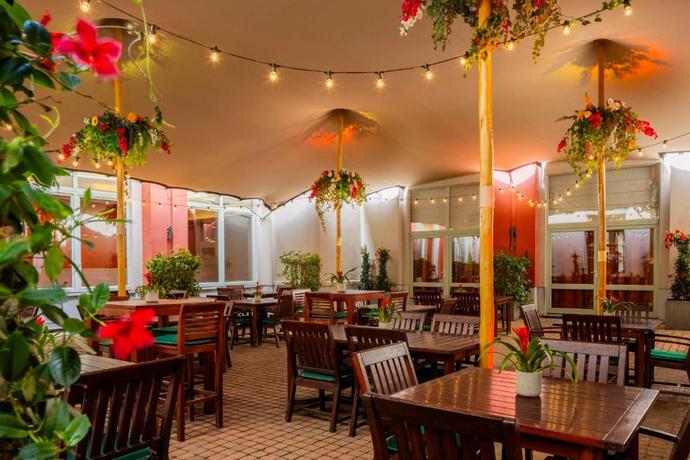 Imagen del bar/restaurante del Hotel NH Collection Gent. Foto 3