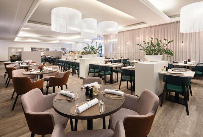 Imagen del bar/restaurante del Hotel NH Collection Gent. Foto 6