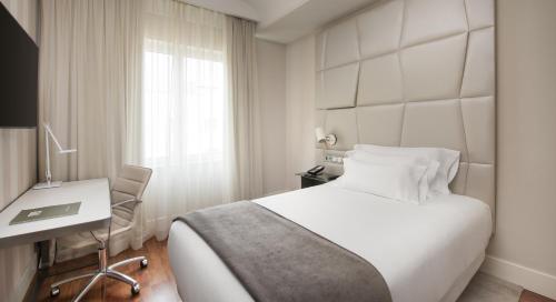 Imagen de la habitación del Hotel NH Collection Madrid Colón. Foto 5