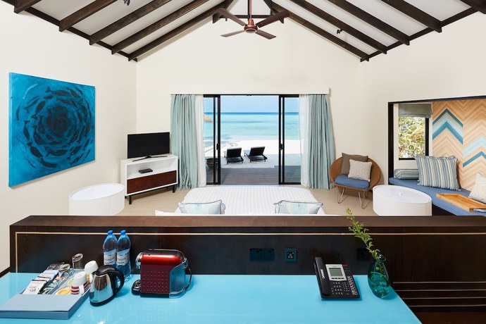 Imagen de la habitación del Hotel NH Collection Maldives Havodda Resort. Foto 2