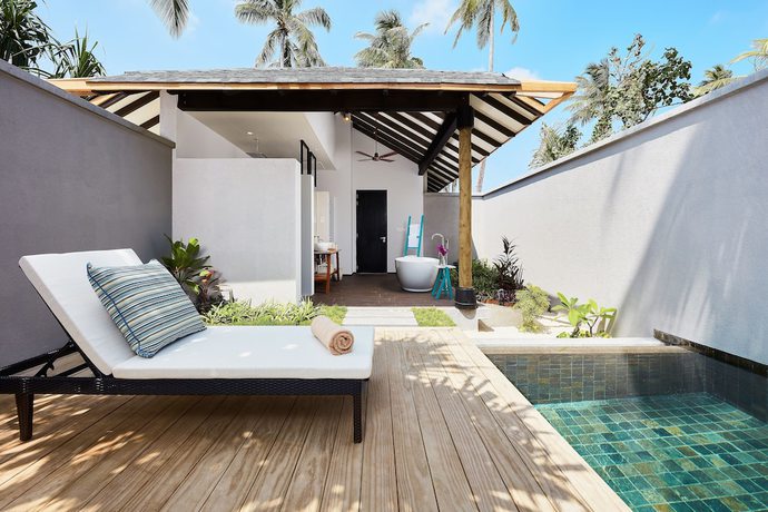 Imagen de la habitación del Hotel NH Collection Maldives Havodda Resort. Foto 5