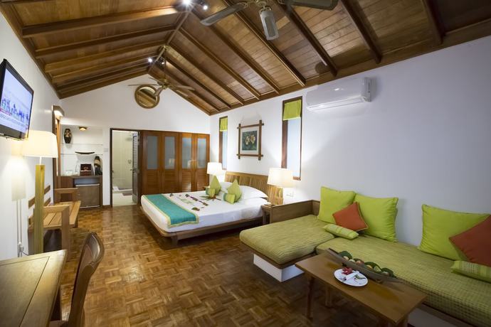 Imagen de la habitación del Hotel NH Collection Maldives Reethi Resort. Foto 12