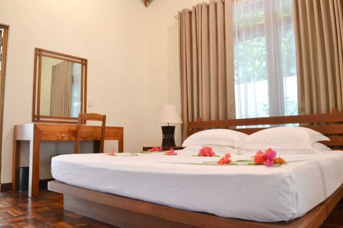 Imagen de la habitación del Hotel NH Collection Maldives Reethi Resort. Foto 15