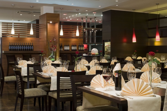 Imagen del bar/restaurante del Hotel NH Collection Salzburg City. Foto 4