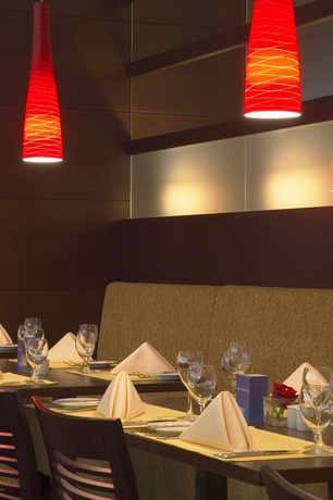 Imagen del bar/restaurante del Hotel NH Collection Salzburg City. Foto 5