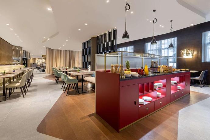 Imagen del bar/restaurante del Hotel NH Collection Salzburg City. Foto 2