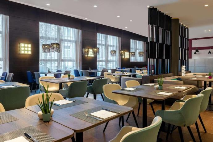 Imagen del bar/restaurante del Hotel NH Collection Salzburg City. Foto 5