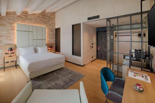 Imagen de la habitación del Hotel NH Collection Venezia Murano Villa. Foto 18