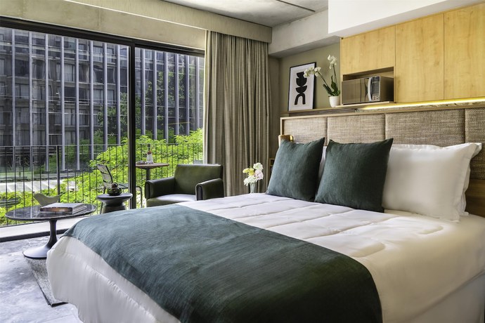 Imagen de la habitación del Hotel NH Guadalajara Studios. Foto 3