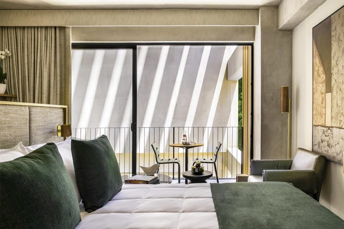 Imagen de la habitación del Hotel NH Guadalajara Studios. Foto 5