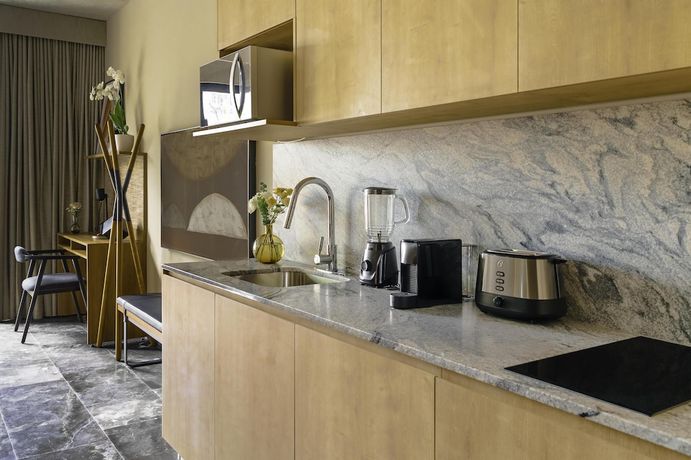 Imagen de la habitación del Hotel NH Guadalajara Studios. Foto 10