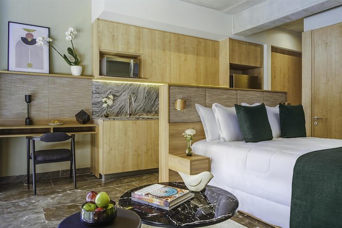 Imagen de la habitación del Hotel NH Guadalajara Studios. Foto 11