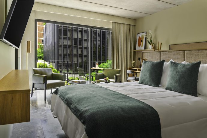 Imagen de la habitación del Hotel NH Guadalajara Studios. Foto 12
