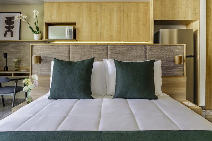 Imagen de la habitación del Hotel NH Guadalajara Studios. Foto 13