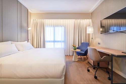 Imagen de la habitación del Hotel NH Lisboa Campo Grande. Foto 17