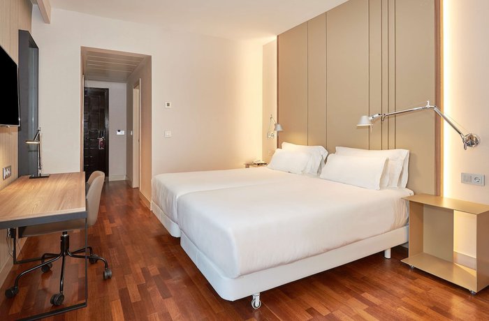 Imagen de la habitación del Hotel NH Luz Huelva. Foto 6