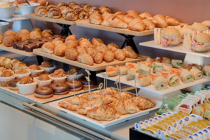 Imagen del bar/restaurante del Hotel NH Milano Corso Buenos Aires. Foto 4