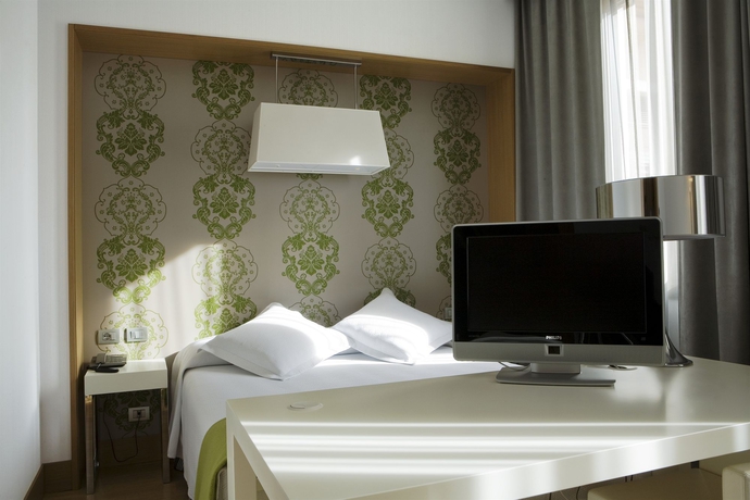 Imagen de la habitación del Hotel NH Milano Touring. Foto 8