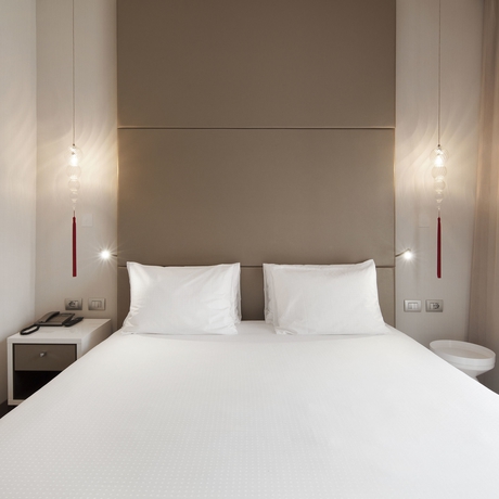 Imagen de la habitación del Hotel NH Milano Touring. Foto 12