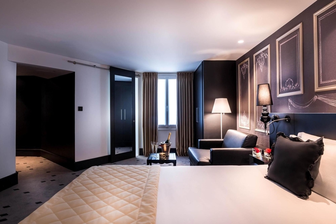 Imagen de la habitación del Hotel NH Paris Champs-Elysées. Foto 9