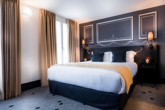 Imagen de la habitación del Hotel NH Paris Champs-Elysées. Foto 10