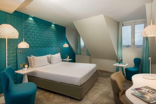 Imagen de la habitación del Hotel NH Paris Gare de l'Est. Foto 4