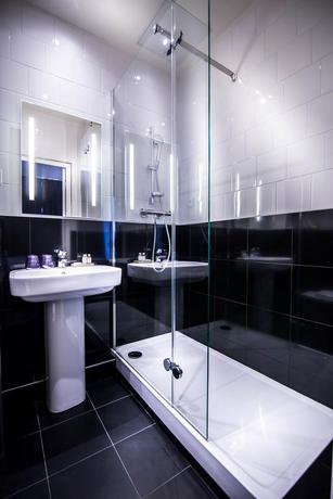 Imagen de la habitación del Hotel NH Paris Opéra Faubourg. Foto 6