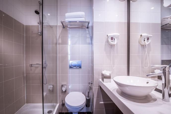 Imagen de la habitación del Hotel NH Paris Opéra Faubourg. Foto 7