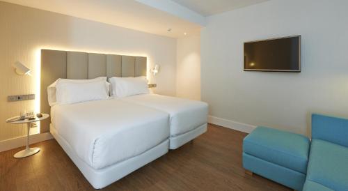 Imagen de la habitación del Hotel NH Sants Barcelona. Foto 10