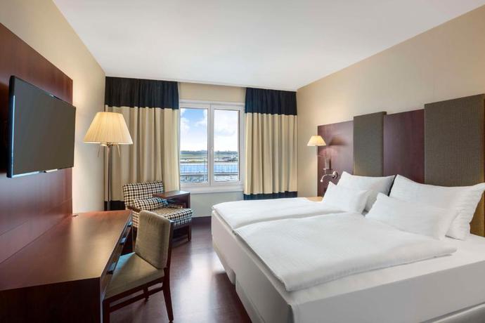 Imagen de la habitación del Hotel NH Vienna Airport Conference Center. Foto 7