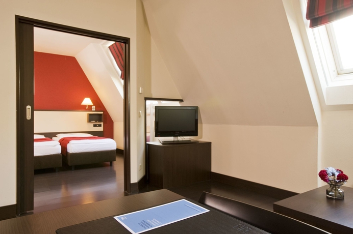 Imagen de la habitación del Hotel NH Wien City. Foto 6