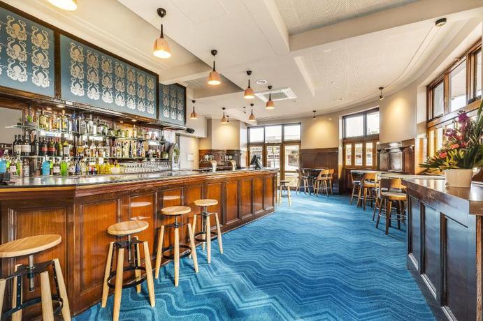 Imagen del bar/restaurante del Hotel NIGHTCAP AT OCEAN BEACH HOTEL. Foto 4