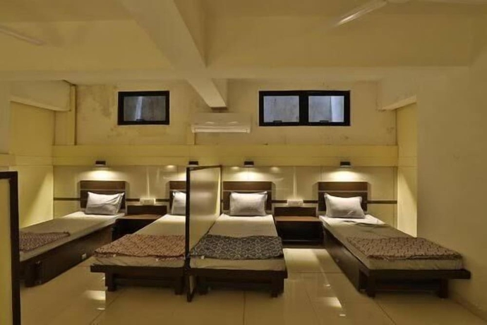 Imagen de la habitación del Hotel NIGHT-HALT Dormitory - Hostel. Foto 7