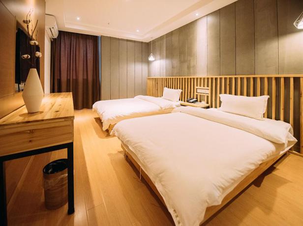Imagen de la habitación del Hotel NINGLAI HOTEL. Foto 2